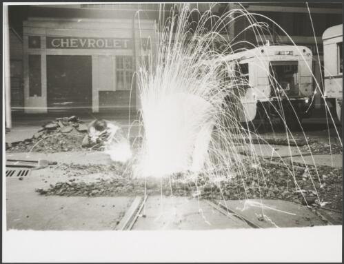 Removing the three-throw point in the tramlines at the entrance to the Light Street Depot, Brisbane,  ca. 1970 [picture]