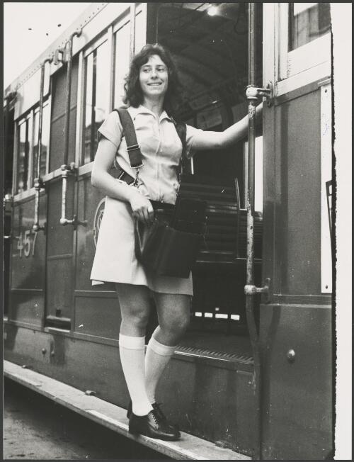The contemporary connie; Christine Zidkowski modelling the new canary yellow A-line frock and knee-length socks uniform in Melbourne, 9 January 1976, 1 [picture]