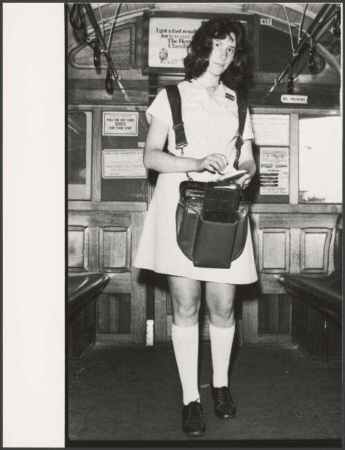 The contemporary connie; Christine Zidkowski modelling the new canary yellow A-line frock and knee-length socks uniform in Melbourne, 9 January 1976, 2 [picture]