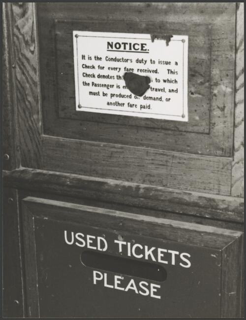 Tram signage, 'It is the Conductor's duty to issue a Check for every fare received. This Check denotes the journey? to which the Passenger is entitled to travel, and must be produced on demand or another fare paid', Sydney, ca. 1976, 2 [picture]