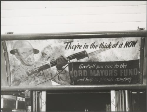 World War 2 advertisement in a tram, 'They're in the thick of it now. Give all you can to the Lord Mayor's Fund and help to provide comforts', Sydney, ca. 1976 [picture]