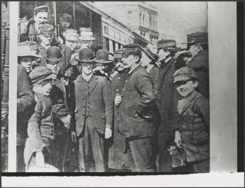 Striking tramways employees and passengers beside a tram, Sydney, 1908 [picture]