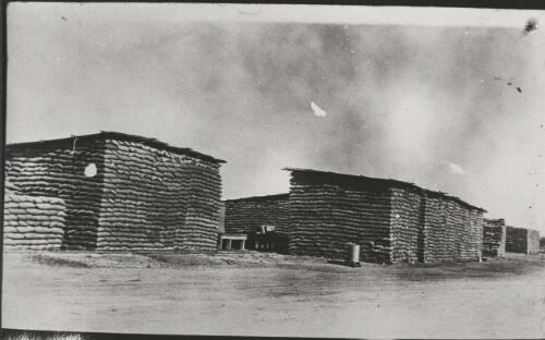 Wheat stacks, Yarrawonga, Victoria, 1924 [picture] / Dennis Brabazon