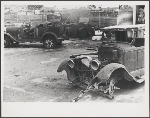 Scrap yard at Yass, New South Wales showing rusting car bodies, 1975 [picture]