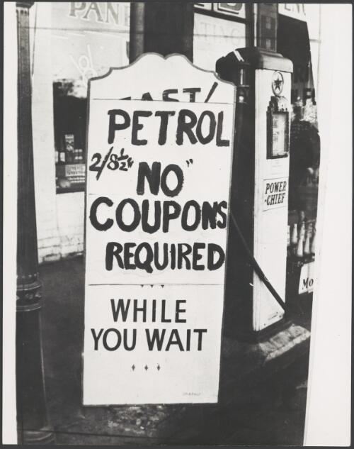 Garage sign advertising the end of petrol rationing, Melbourne, 1949 [picture]