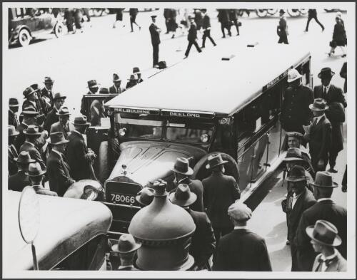 Melbourne to Geelong bus run by the Victorian Railways, outside the entrance to Flinders Street Station, Melbourne, ca. 1935, 2 [picture]