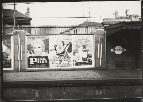 Advertising billboard for Dr Williams' Pink Pills, Braithwaite's leather soles and Grant's Liqueur Scotch whisky on railway platform, Hawksburn, Victoria, ca. 1930 [picture]
