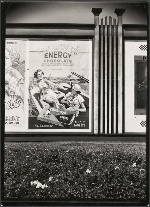 Advertising billboard for Cadbury's energy chocolate on railway platform, Melbourne, ca. 1930 [picture]