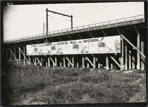 Advertising billboard for Old Dutch Cleanser on railway bridge, Melbourne, ca. 1930 [picture]