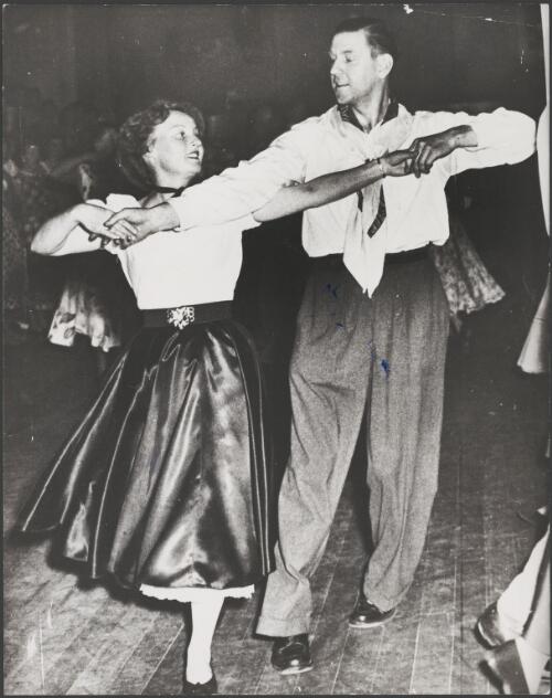 Couple square dancing in a championship grand final, Prahran, Victoria, ca. 1952 [picture]