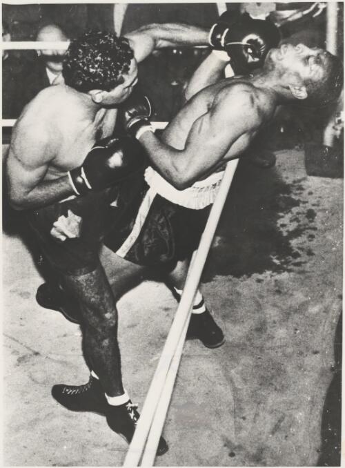 Australian boxer Dave Sands knocks out American Henry Brimm, Sydney, 1950 [picture]