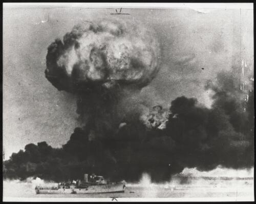 Neptuna, which had been carrying mines, being blown up during the first Japanese air raid on Darwin during World War II, Darwin, 19 February 1942 [picture]