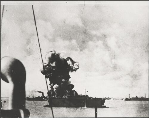 USS Peary burns behind HMAS Katoomba, with HMAS Manunda on the right, after a Japanese air raid, Darwin, 1942 [picture]