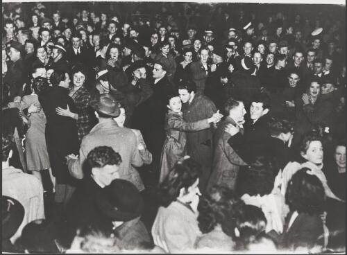 Dancing in Collins Street to celebrate victory, Melbourne, 13 June 1945 [picture]