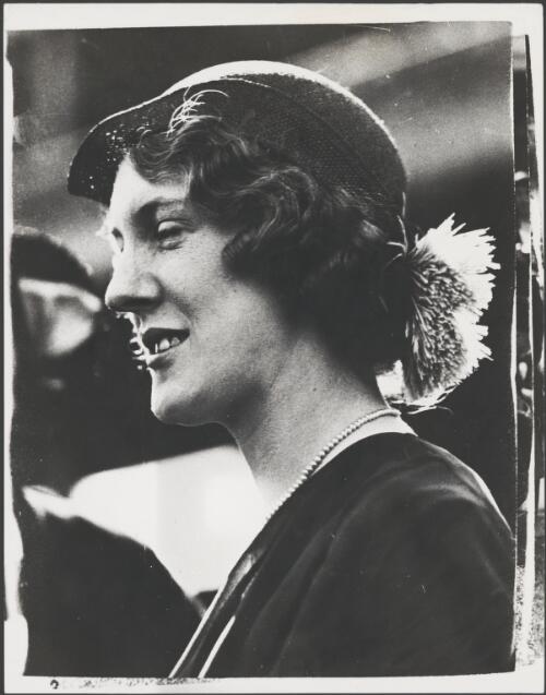 Woman wearing a close-fitting hat over her short, curled hair at the Melbourne Cup, Melbourne, 1931 [picture]