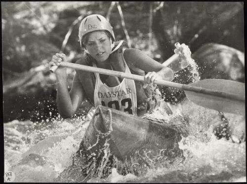 Eke Woldring from Wollongbar, New South Wales, and her partner in the double Canadian section of the Australian White Water Canoe Championships on the Mitta Mitta river, Victoria, 1977 / Bruce Howard