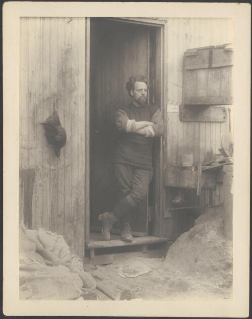 [Harold Hamilton standing outside hut, Australasian Antarctic Expedition 1911-1914] [picture] / Correll