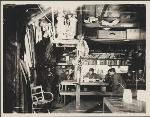 [Interior of Commonwealth Bay living hut, left to right Mertz, McLean, Madigan, Hunter and Hodgeman, Australasian Antarctic Expedition, 8 June 1912] [picture] / Hurley