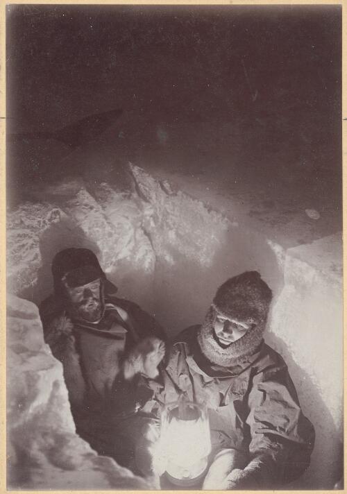 [Two men standing in a hole in the ice, Australasian Antarctic Expedition, 1911-1914] [picture]