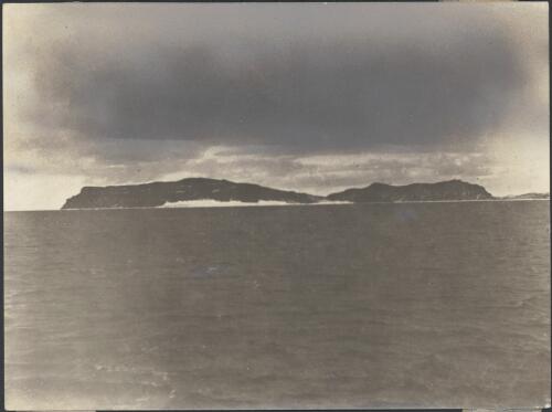 [Ocean with landmass in background, Australasian Antarctic Expedition, 1911-1914] [picture]