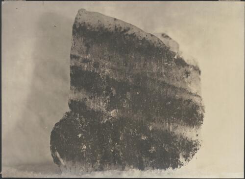 Peat inclusion in ice, [Australasian Antarctic Expedition, 1911-1914] [picture]