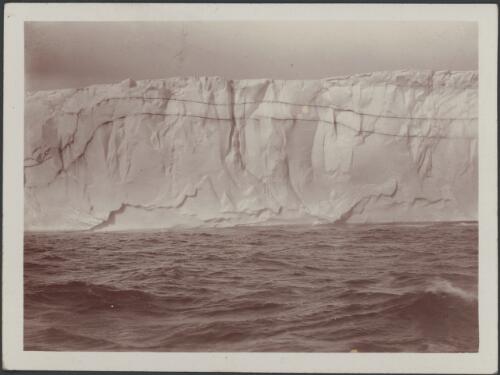 Englacial moraine in sea cliff on the Reeves Piedmont, [Australasian Antarctic Expedition, 1911-1914] [picture]