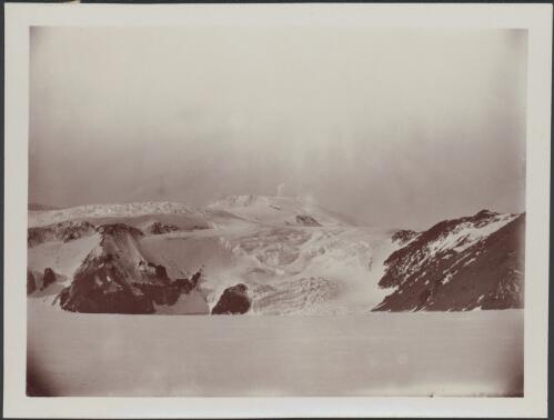Small glacier entering McMurdo Sound to south of the Turk's Head Glacier, looking  north east to Mount Erebus, [British Antarctic Expedition, 1907-1909] [picture]