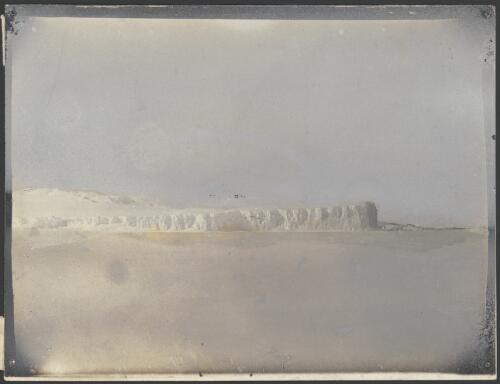 [Snow covered cliffs at the sea edge, Australasian Antarctic Expedition, 1911-1914] [picture]