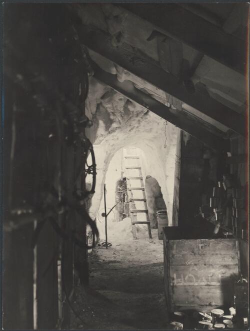 [Entrance and storage area of the Western? Base hut, Australasian Antarctic Expedition, 1911-1914] / Moyes