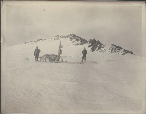 Madigan Nunatak, Close and Laseron with the sledge, [Australasian Antarctic Expedition, 1911-1914] [picture]/ Laseron