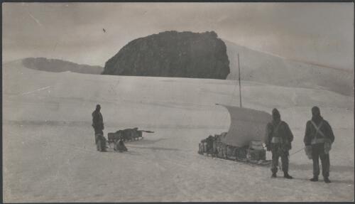 [Three members of the group with dogs and sledges in the snow, Australasian Antarctic Expedition, 1911-1914] [picture] / Watson