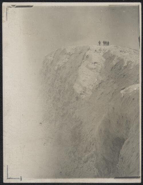 The active crater of Erebus 900 feet deep and half a mile wide, steam is seen rising to the left, [British Antarctic Expedition, 1907-1909] [picture]