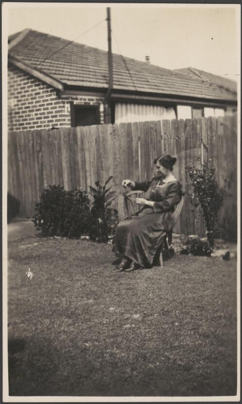Elizabeth Haynes' sister seated in the garden, Sydney, approximately 1930, 1 / Albert Dryer