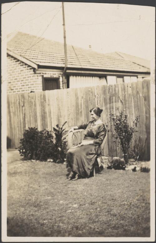 Elizabeth Haynes' sister seated in the garden, Sydney, approximately 1930, 2 / Albert Dryer