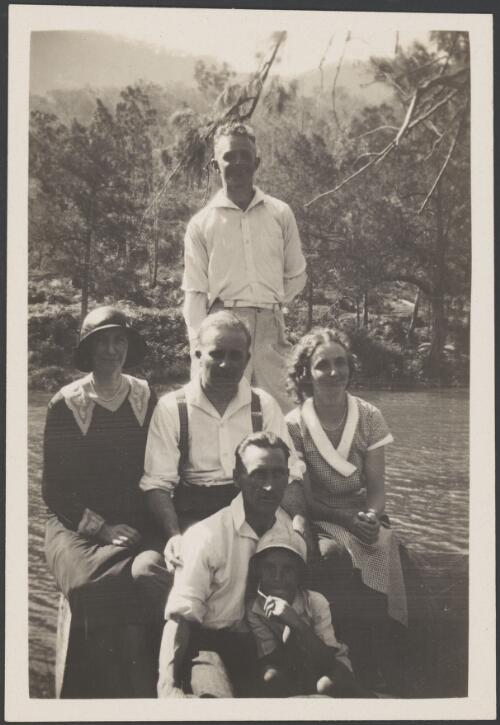 Elizabeth Haynes and Albert Dryer seated with a group by the river, Sydney, approximately 1930