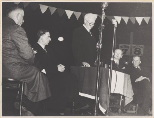 Albert Dryer on the speaker's platform with Eamon de Valera on his right, at a reception held in de Valera's honour at Sydney Stadium, Sydney, 1948