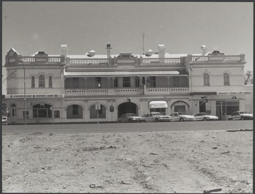 Narrabri : Club House Hotel, Maitland Street - foreground is the rubble site of the demolished Fox store which was gutted by fire in 1993 [picture] / photograph by Fiona MacDonald Brand