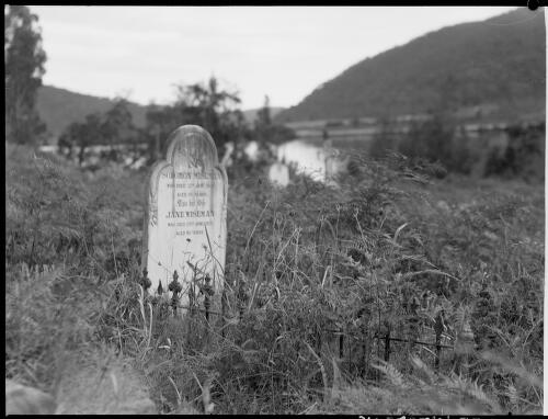 Gravestone of Solomon and Jane Wiseman, Wisemans Ferry, Hawkesbury River, New South Wales, ca. 1945 [picture] / E.W. Searle