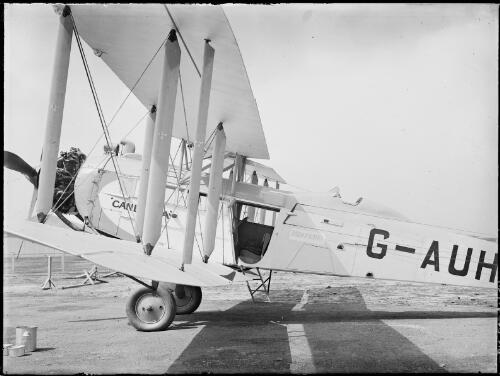 G-AUHW, a De Havilland 61 Giant Moth named Canberra, from the side with an open door, Australia, ca. 1932 [picture] / E.W. Searle