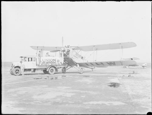 G-AUHW, a De Havilland 61 Giant Moth named Canberra, refueling, Australia, ca. 1932 [picture] / E.W. Searle