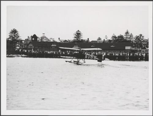Avro 504 taxiing across water, Manly, Sydney Harbour, 1920 [picture] / E.W. Searle