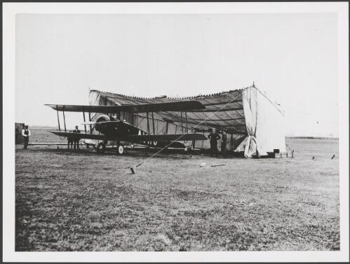 Avro 504 parked partly in a tent, Australia, 1920 [picture] / E.W. Searle