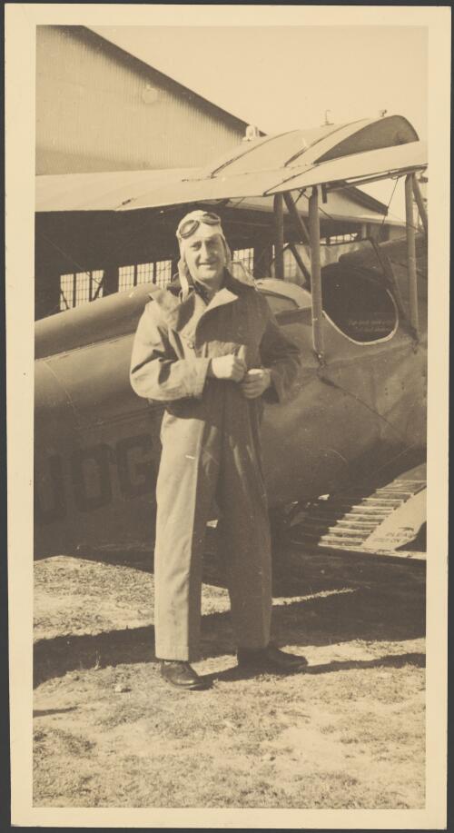 Henry Goya standing beside his General Aircraft Genairco, VH-UOG, Newcastle, New South Wales, ca. 1934 [picture] / E.W. Searle
