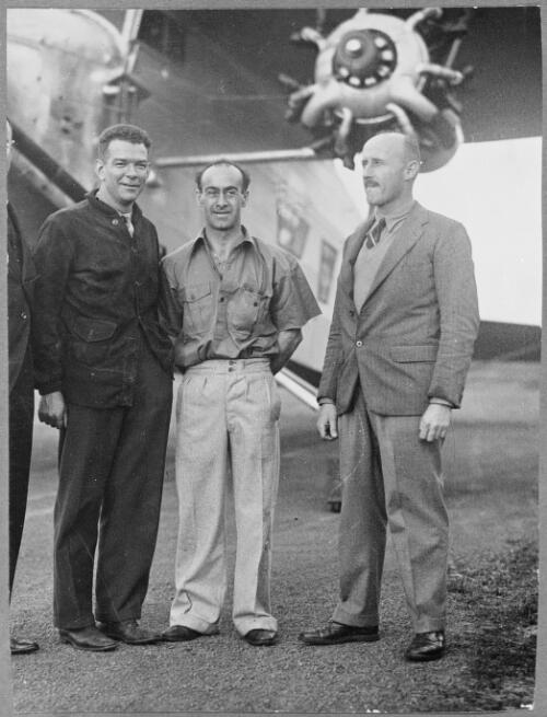 Charles Ulm, Scotty Allen and P.J. Taylor standing beside Faith in Australia, VH-UXX, an Avro 618 Ten Modified, Australia, ca. 1933 [picture] / E.W. Searle