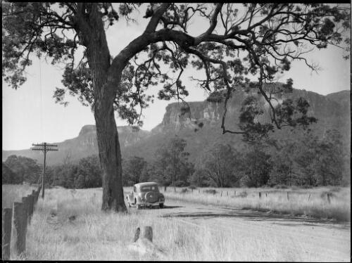 E.W. Searle's Citroen with mountains in the distance, New South Wales, ca. 1949 [picture] / E.W. Searle