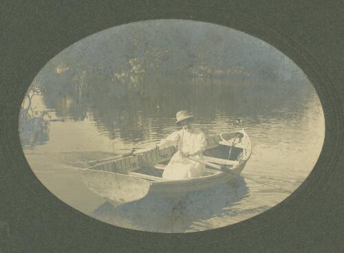 Maria Searle rowing a boat, Tasmania, ca. 1910 [picture] / E.W. Searle
