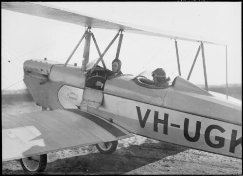 Pilot and passenger on board VH-UGK, an Alexander Eaglerock A-2, Sydney, ca. 1932 [picture] / E.W. Searle