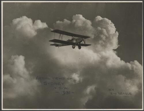 VH-UGK, an Alexander Eaglerock A-2, in flight, Mascot Airport, Sydney, ca. 1932, 1 [picture] / E.W. Searle