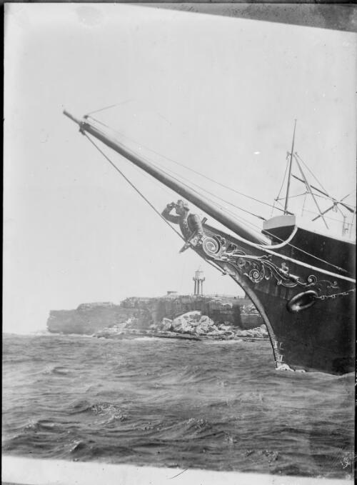 Figurehead on the prow of the pilot boat Captain Cook, Sydney Harbour, ca. 1930, 1 [picture] / E.W. Searle