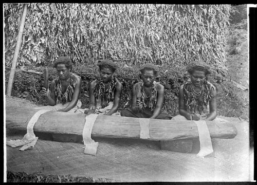 Four women beating tapa cloth, Fiji, ca. 1920 [picture] / E.W. Searle